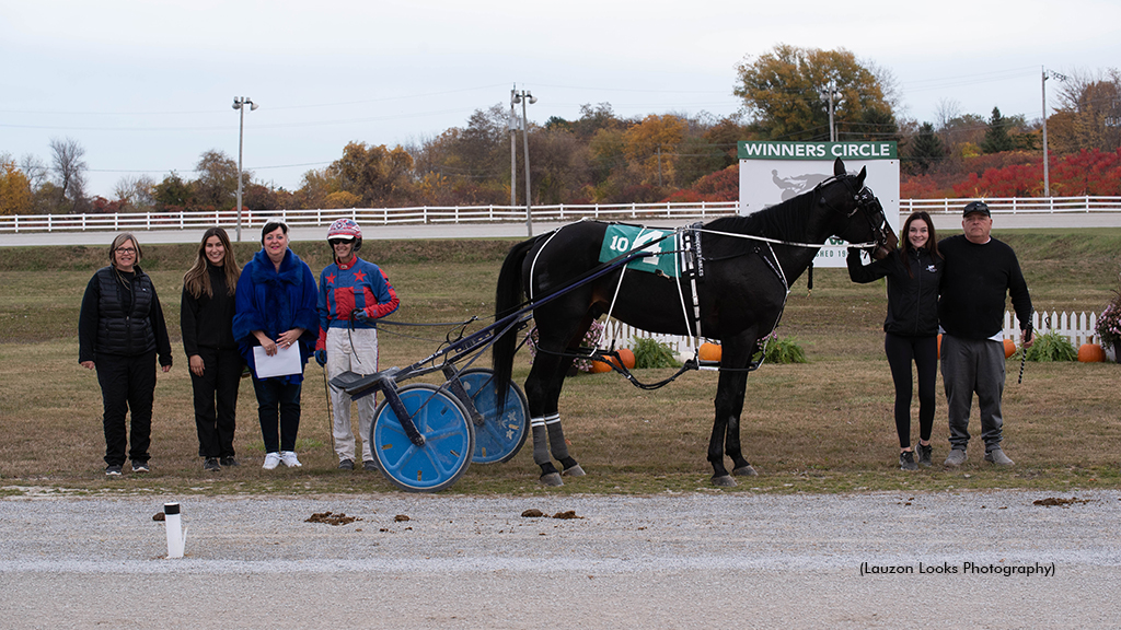 Docs Rock in the winner's circle at Leamington Raceway