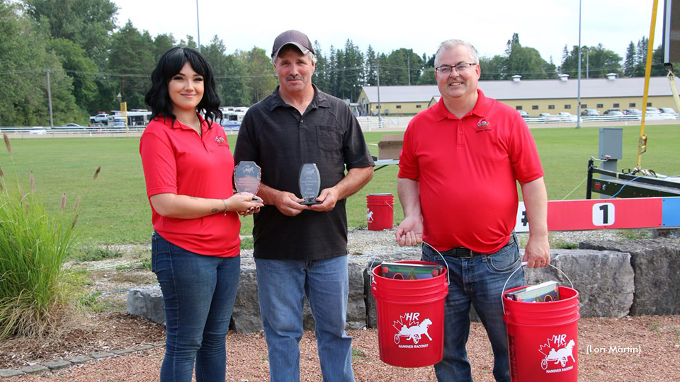 John Kennedy with John Kennedy (top) and Diamonds Or Twine's owners Garry MacDonald and Christina Soundy with Hanover Raceway's Caity Hillier and Steve Fitzsimmons