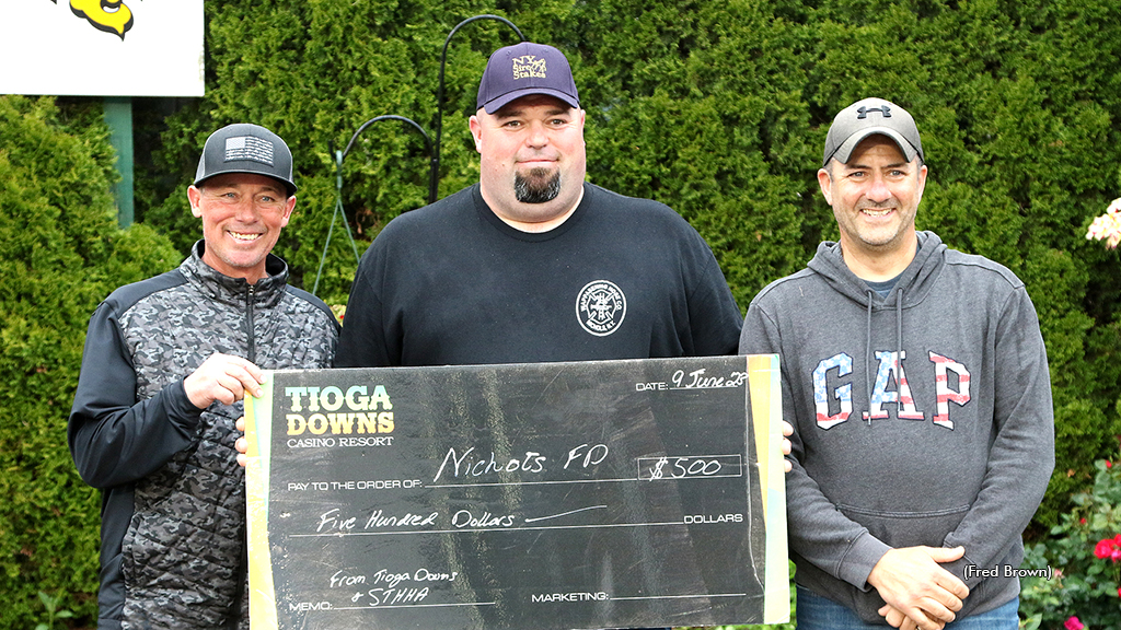 STHHA members Dale Gilmour and Mike Sinclair with Chief Ray Thetga Jr.