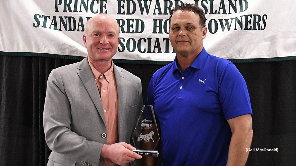 The Standardbred Canada Owner of the Year Award was presented to Danny Birt (right) by Standardbred Canada Director Bruce Wood.