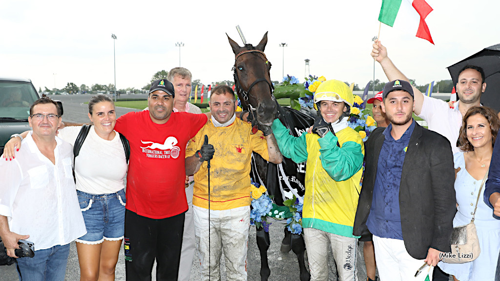 Vivid Wise As and connections in the International Trot winner's circle