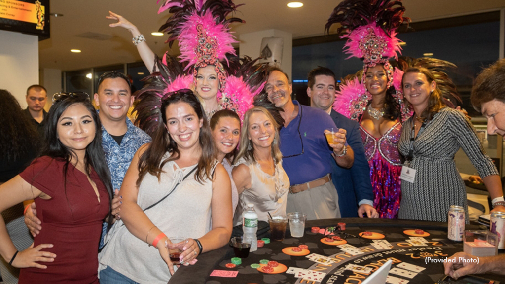 A group enjoying Hambletonian Charity Casino Night