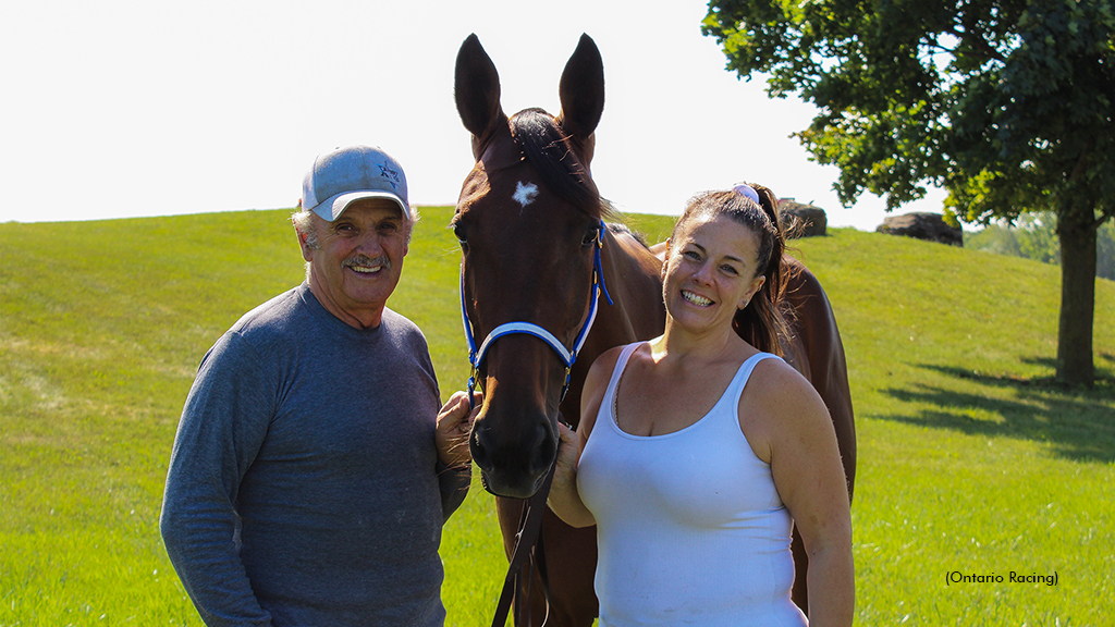 Nicole Bourgeois-Stocker and her father Rheal Bourgeois with Hawaii