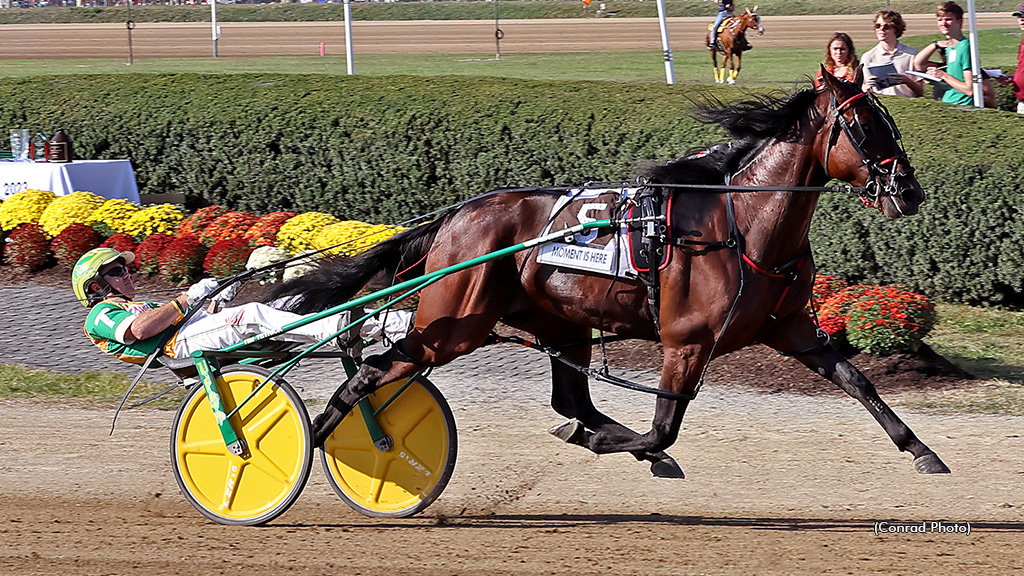 Moment Is Here winning a Little Brown Jug elimination heat