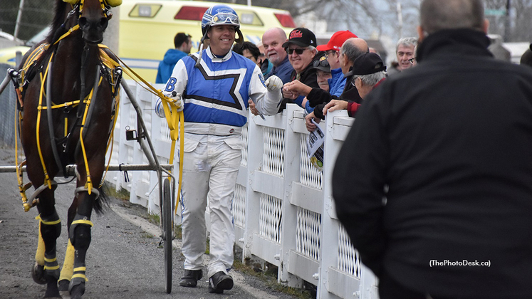 Driver Pascal Berube greets fans after his 100th 3R seasonal win with Cafe Society last November.